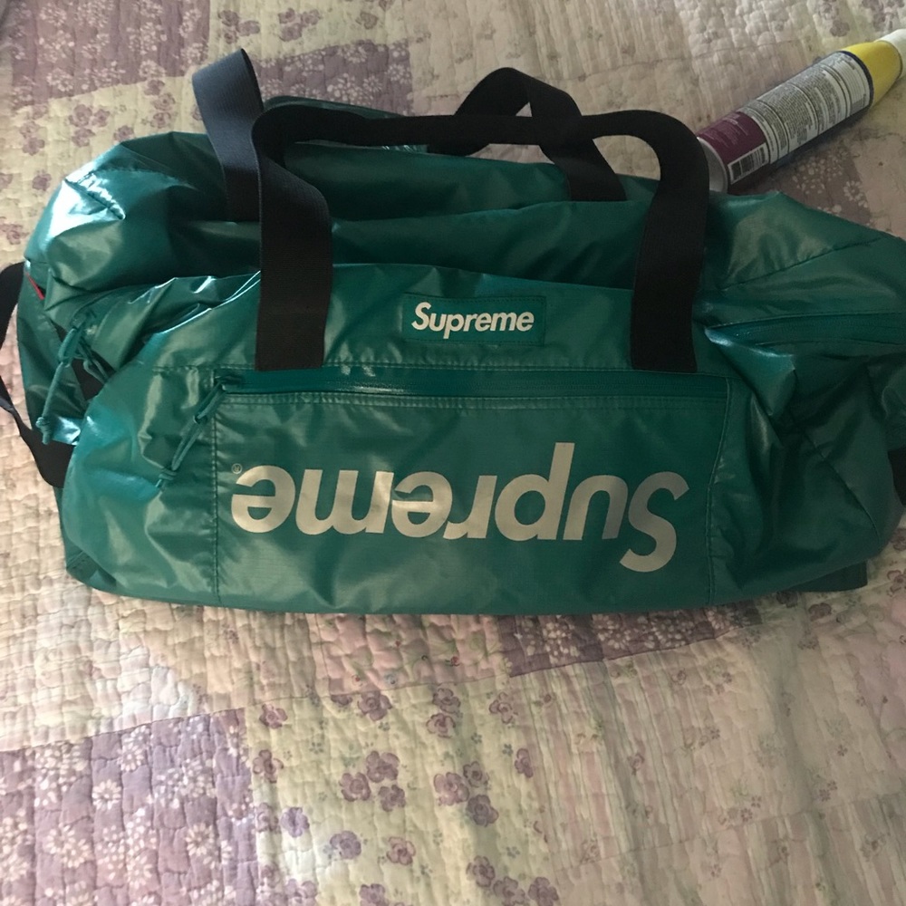 Teal supreme duffle bag “MISPRINT”
